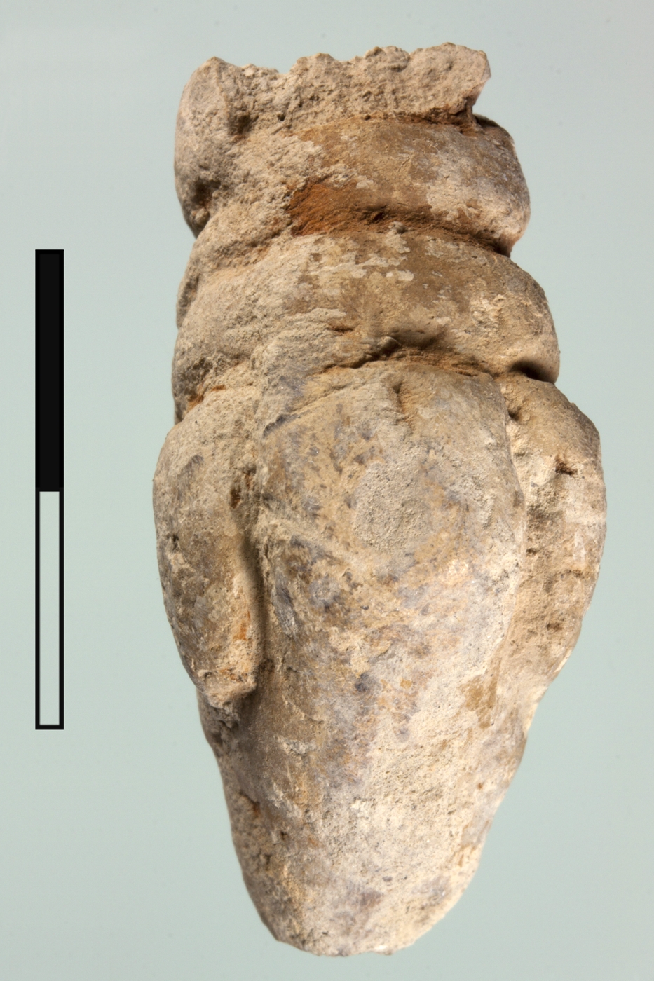 Stylized anthropomorphic clay figurine from a pit in Unit H that post-dates the Meana Horizon.