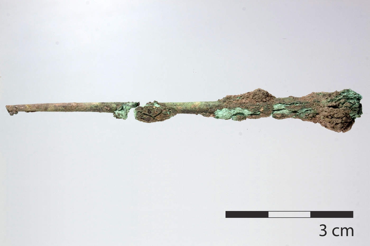 A portion of a copper pin or needle from an Aeneolithic context.