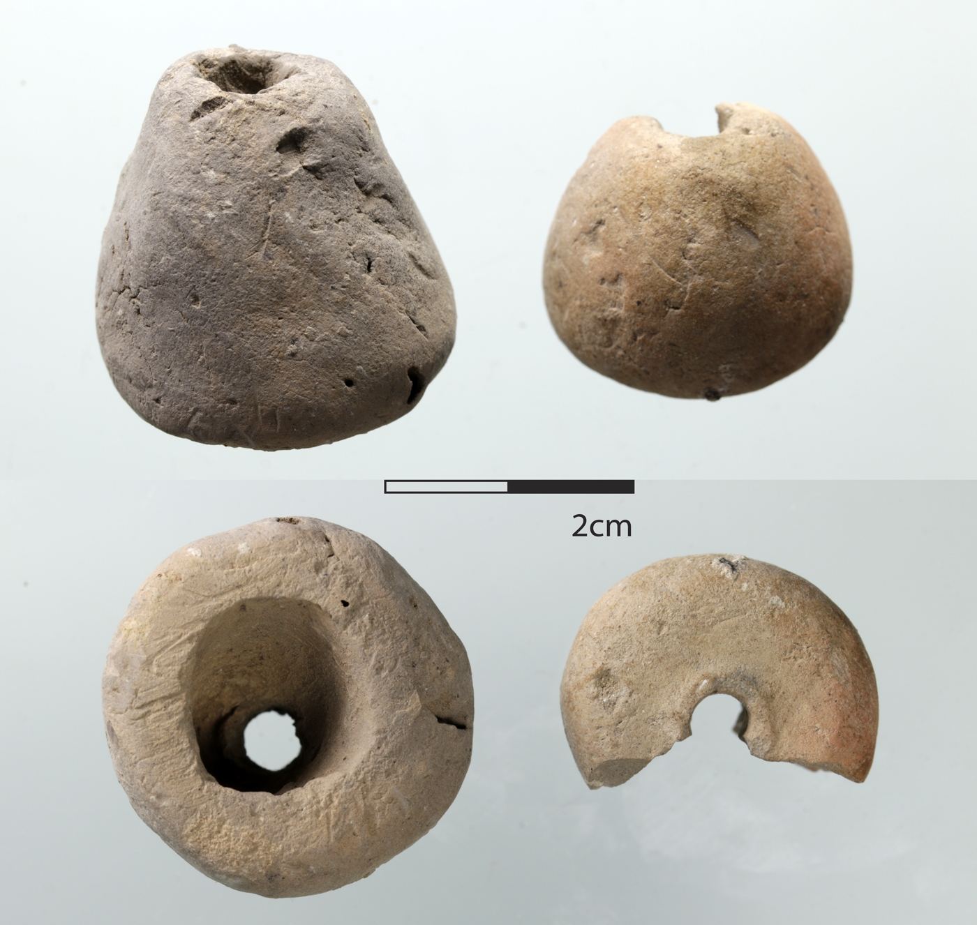 Funnel-shaped (left) and conical (right) spindle whorl 